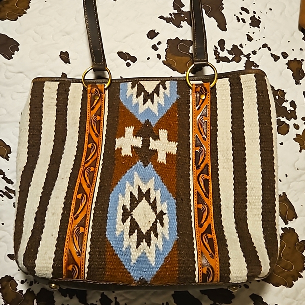 Beautiful  Real leather  and wool woven handbag Roomy inside.